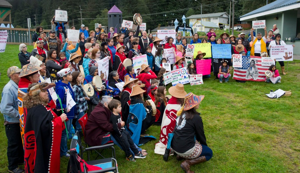 About 100 people attend a rally at Twin Lakes Wednesday evening in solidarity with the Standing Rock Sioux Tribe in North Dakota over the construction of the 1,172-mile Dakota Access pipeline.