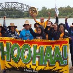 Doug Chilton, middle in blue T-shirt, stands with part of the canoe crew representing the One People Canoe Society along the Missouri River in North Dakota.