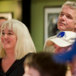 Rep. Cathy Muñoz and her husband, Juan, watch national and state elections results during a party at the Canton Asian Bistro on Tuesday.