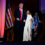 President-elect Donald Trump smiles as he arrives to speak to an election night rally, Wednesday in New York. From left, Trump, Melania Trump, Ivanka Trump, and Tiffany Trump.