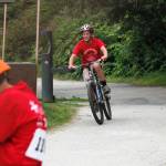 Reed Maier, 11, rides while younger racers watch at the Douglas Dirt Derby on Saturday, Aug. 4, 2018 at Savikko Park in Douglas. Maier finished first in his age group, and the event raised $6,000 for the American Diabetes Association. (Alex McCarthy | Juneau Empire)