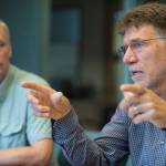 University of Alaska President Jim Johnsen, left, listens to Dr. Steve Atwater, Executive Dean of the universitys new Alaska College of Education, during an interview at the University of Alaska Southeast on Friday, August 3, 2018. (Michael Penn | Juneau Empire)