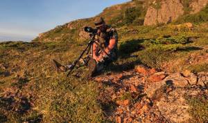 California resident Cody Lee glasses the alpine for blacktail deer the evening before Opening Day near Ketchikan. (Jeff Lund | For the Juneau Empire)
