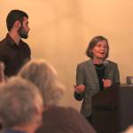 Eva Bornstein, program officer for the Juneau Economic Development Council, speaks at the Juneau Chamber of Commerce Luncheon at the Moose Lodge on Thursday, Aug. 9, 2018 alongside JEDC intern Gunnar Schultz. (Alex McCarthy | Juneau Empire)