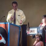 Deputy Mayor Jerry Nankervis applauds Lily Hope for the Individual Artist Award during the Mayors Awards for the Arts at the Juneau Arts & Culture Center on Friday, August 17, 2018. (Michael Penn | Juneau Empire)