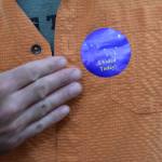 Jerry Nankervis, Republican candidate for House District 34, puts on his I Voted sticker after casting his ballot on Tuesday, Aug. 21, 2018 in Alaskas statewide primary election. (James Brooks | Juneau Empire)