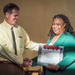 Deputy Mayor Jerry Nankervis congratulates Sherry Patterson for the Achievement in the Arts Award during the Mayors Awards for the Arts at the Juneau Arts & Culture Center on Friday, August 17, 2018. (Michael Penn | Juneau Empire)