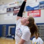 Senior Audrey Welling spikes the ball during Thunder Mountain High School varsity volleyball practice at TMHS on Wednesday, August 15, 2018. (Michael Penn | Juneau Empire)
