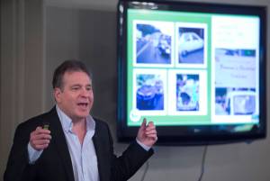 Duff Mitchell gives an update to electric vehicles usage in Juneau to the Juneau Chamber of Commerce during their weekly luncheon at the Moose Lodge on Thursday, Aug. 23, 2018. (Michael Penn | Juneau Empire)