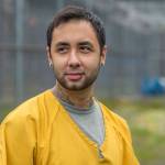 Inmate Patrick Sweeney talks about his work on a flower-growing collaboration with Frenchies Floral Studio at Lemon Creek Correctional Center on Friday, Aug. 24, 2018. (Michael Penn | Juneau Empire)