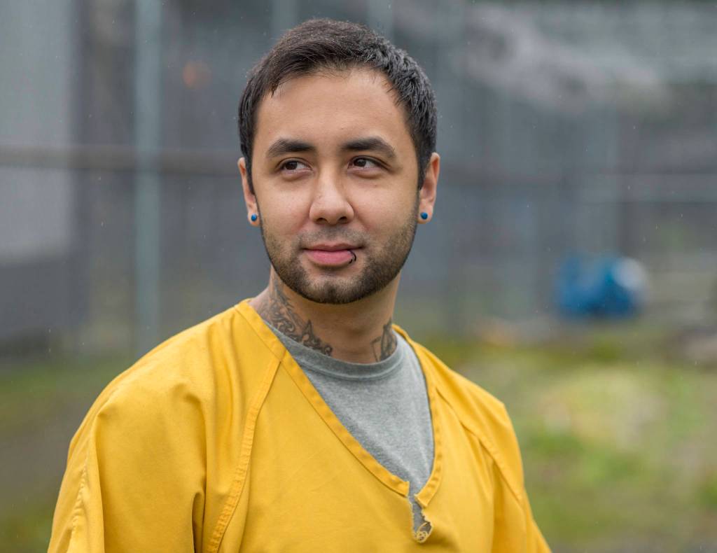 Inmate Patrick Sweeney talks about his work on a flower-growing collaboration with Frenchies Floral Studio at Lemon Creek Correctional Center on Friday, Aug. 24, 2018. (Michael Penn | Juneau Empire)