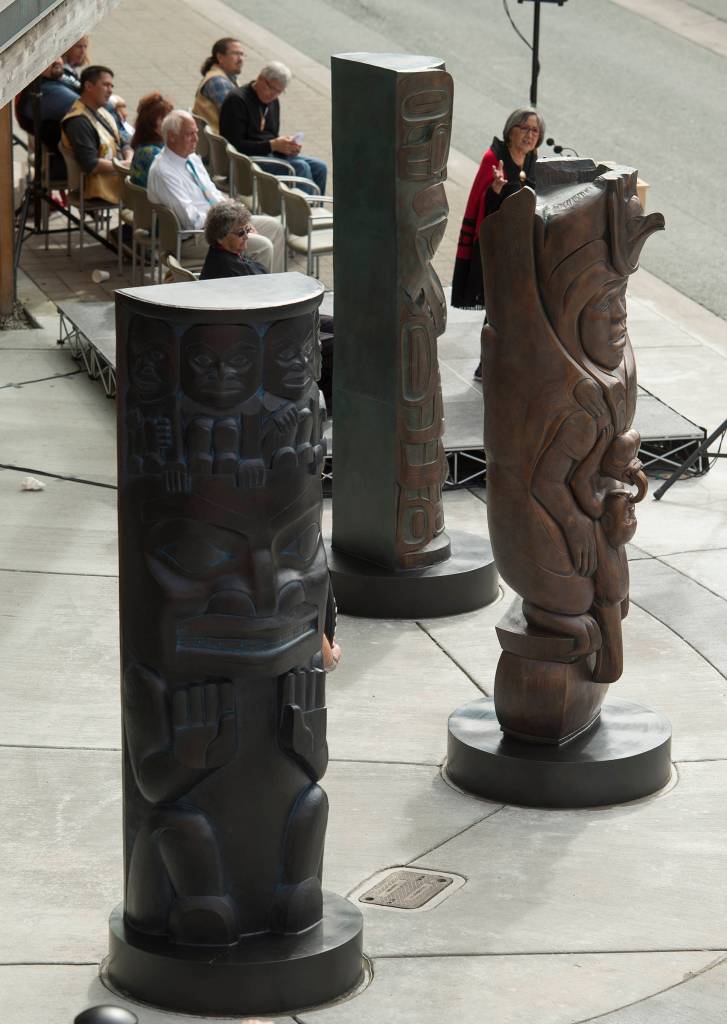 Rosita Worl, president of the Sealaska Heritage Institute, speaks during an unveiling ceremony for three bronze house posts in front of the Walter Soboleff Center by Sealaska Heritage Institute on Sunday, Aug. 26, 2018. (Michael Penn | Juneau Empire)