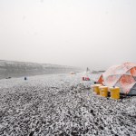 The campsite for researchers is seen at the dig site along the Colville River near Nuiqsut in 2014. Researchers at the University of Alaska Fairbanks have found a third distinct dinosaur species documented on Alaska's oil-rich North Slope. The new species is a type of hadrosaur, a duck-billed plant-eater.