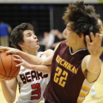 JDHS' Treyson Ramos, left, charges Ketchikan’s Nathan Bonck.