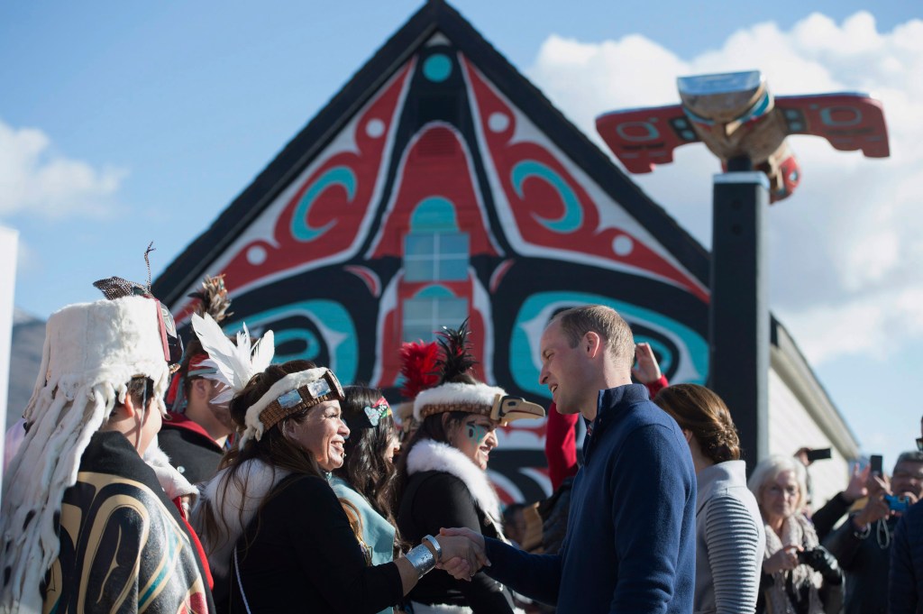 Britain's Prince William and his wife Kate, the Duke and Duchess of Cambridge, greet residents during a welcoming ceremony in Carcross, Yukon, Wednesday.