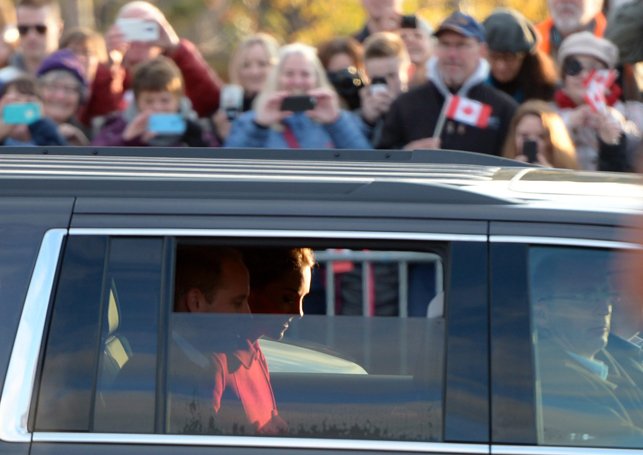 Britain's Prince William and his wife Kate, the Duke and Duchess of Cambridge, arrive to tour the MacBride Museum of Yukon History in Whitehorse, Yukon, Wednesday.