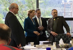 Members of the House Bill 247 conference committee hold a brief discussion before opening a meeting at 8 a.m. Monday, June 6, 2016. From left are Sen. John Coghill, R-North Pole; Sen. Cathy Giessel, R-Anchorage; Sen. Peter Micciche, R-Soldotna; and Rep. David Talerico, R-Healy.