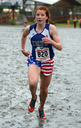 Thunder Mountain senior Naomi Welling wins the 4A girls Region V cross country championship at Sandy Beach on Saturday.