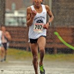 Juneau-Douglas senior Alize Arthur wins the Region V 4A boys cross country championship on Saturday at Sandy Beach.