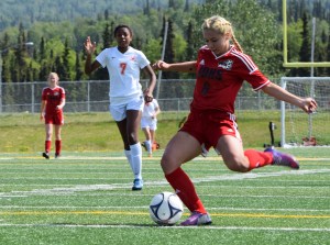JDHS freshman Brianna Jokerst shoots against West Anchorage High School during their state tournament game on Thursday.