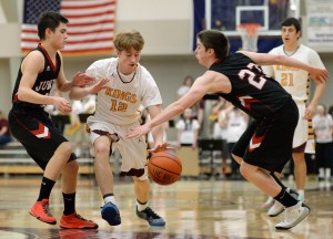 The Juneau-Douglas High School boys basketball team split its two-game road series against the Ketchikan Kings this weekend.