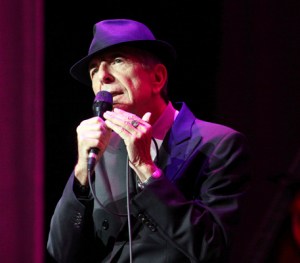In this March 22, 2013 file photo, Leonard Cohen performs on the Old Ideas World Tour, at The Fabulous Fox Theatre in Atlanta. Cohen, the gravelly-voiced Canadian singer-songwriter of hits like “Hallelujah,” "Suzanne” and "Bird on a Wire," has died, his management said in a statement Thursday, Nov. 9, 2016. He was 82.