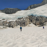 Researchers Allison Bidlack, Jason Fellman and Sonia Nagorski collect snow samples to determine the amounts of back carbon on the Juneau Icefield.
