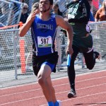 Thunder Mountain's Aiden Hildebrand competes in the 4x100-meter relay Saturday in Anchorage during the state track and field championships. The TMHS team finished first with a time of 43.73 seconds.