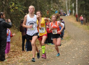 In this file photo from Oct. 1, 2016, Juneau-Douglas High School cross country runner Sadie Tuckwood leads at the state girls cross country championships at Bartlett High School. Tuckwood won the state championship that year.