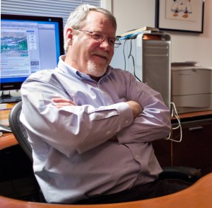 Peter Metcalfe photographed in his home office in November 2014. (Michael Penn | Juneau Empire File)