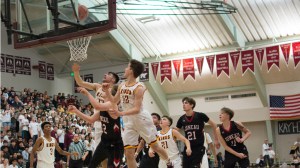 Juneau&rsquo;s Kasey Watts scores and is fouled to tie the score at 51 to end the fourth quarter in Ketchikan on Saturday, Jan. 28, 2017. The Kings responded by scoring the first 14 points of the fourth quarter to put the game away. (Larry Johansen | For the Juneau Empire)