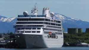 This June 26, 2014 photo, shows a cruise ship docked in Juneau. Alaska expects 1.06 million cruise passengers this year, breaking its 2008 record of 1.03 million visits. The Alaska Travel Industry Association says larger ships are bringing more visitors, and destinations like Sitka, Juneau and Icy Strait Point have built out piers to accommodate bigger vessels. Smaller ships are simultaneously expanding service, specializing in more remote destinations the bigger ships can&rsquo;t reach. (Becky Bohrer | The Associated Press file)