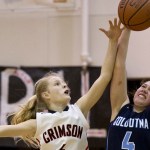 Juneau-Douglas&rsquo; Sadie Tuckwood, left, and Soldotna&rsquo;s Mei Miller go for ball at JDHS on Friday. JDHS won 48-46. (Michael Penn | Juneau Empire)