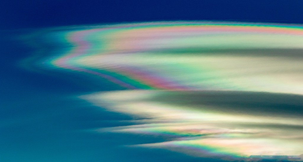 Rainbow colored lenticular cloud. Photo by Kerry Howard