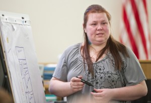 Tiffany Albertson stands in front of a diagram of her mobile home during the trial of Christopher D. Strawn in Juneau Superior Court on Monday, Feb 13, 2017. Strawn is accused in the murder of 30-year-old Brandon C. Cook at the Kodzoff Acres Mobile Home Park Oct. 20, 2015. (Michael Penn | Juneau Empire)