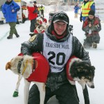 Matt Hall poses with his lead dogs after winning the 2017 Yukon Quest International Sled Dog Race on Tuesday in Fairbanks. (Eric Engman | Fairbanks Daily News-Miner)