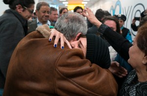 In a Monday, Feb. 6, 2017 photo, family members who have just arrived from Syria embrace and are greeted by family who live in the United States upon their arrival at John F. Kennedy International Airport in New York. Organizers in cities across the U.S. are telling immigrants to miss class, miss work and not shop on Thursday, Feb. 16, 2017, as a way to show the country how important they are to America&rsquo;s economy and way of life. &ldquo;A Day Without Immigrants&rdquo; actions are planned in cities including Philadelphia, Washington, Boston and Austin, Texas. (Craig Ruttle | The Associated Press)