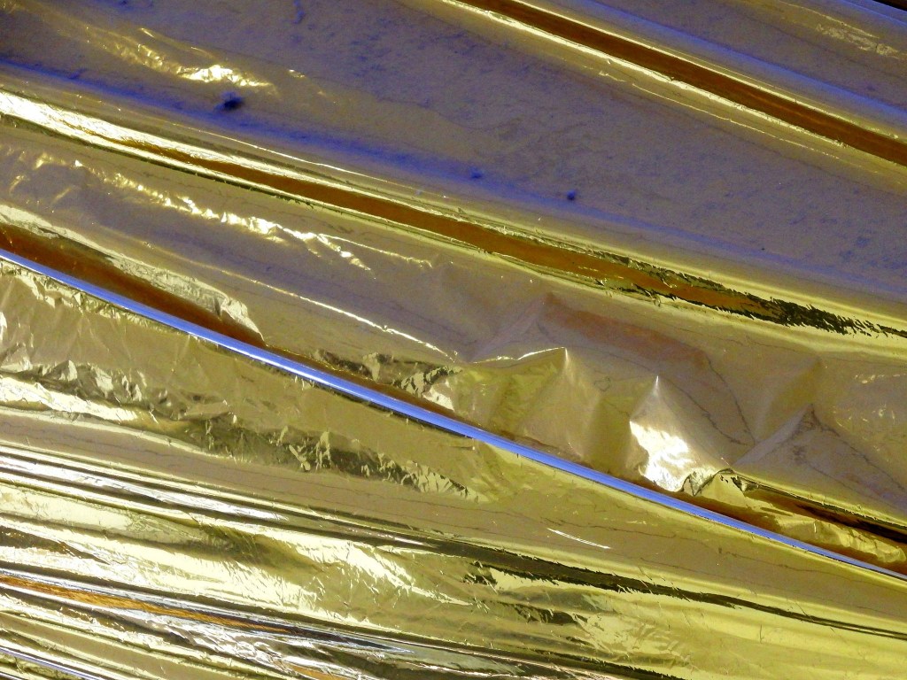 Surface of a weather satellite on display at the Earth Sciences Laboratory in Boulder Colorado. Photo by Linda Shaw.