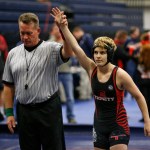 In this Feb. 18 photo, Euless Trinity&rsquo;s Mack Beggs is announced as the winner of a semifinal match after Beggs pinned Grand Prairie&rsquo;s Kailyn Clay during the finals of the UIL Region 2-6A wrestling tournament at Allen High School in Allen, Texas. Beggs, who is transgender, is transitioning from female to male, won the girls regional championship after a female opponent forfeited the match. (Nathan Hunsinger | The Dallas Morning News)
