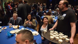 Coppa owner Marc Wheeler hands out his candied salmon ice cream at the Symphony of Seafood event Wednesday at Centennial Hall. Wheeler&rsquo;s ice cream took home the competition&rsquo;s grand prize.