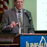 Alaska Electric Light & Power President and General Manager Timothy McLeod speaks to the Juneau Chamber of Commerce during their luncheon at the Hangar Ballroom on Thursday. (Michael Penn | Juneau Empire)