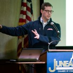 Alec Mesdag, Director of Energy Services at AEL&P, speaks to the Juneau Chamber of Commerce during their luncheon at the Hangar Ballroom on Thursday. (Michael Penn | Juneau Empire)