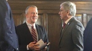 U.S. Sen. Dan Sullivan, R-Alaska, talks with Alaska Lt. Gov. Byron Mallott on Friday, Feb. 24, 2017 in the Alaska Capitol before Sullivan was presented with a legislative resolution in support of oil and gas drilling within the Arctic National Wildlife Refuge. (James Brooks | Juneau Empire)