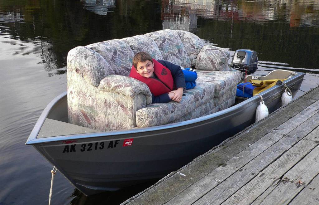 Jason and Jay Beedle delivered their couch to their home on Shelter Island via skiff. Photo by Jay Beedle.