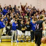 Thunder Mountain fans celebrate after a basket Tuesday during the Falcons 56-40 win against Juneau-Douglas during the first round of the Region V 4A tournament in the Juneau-Douglas gym in Juneau. (Taylor Balkom | Ketchikan Daily News)