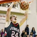 Juneau-Douglas junior Erik Kelly (24) dunks the ball Tuesday during the Crimson Bears&rsquo; 56-40 loss to Thunder Mountain during the first round of the Region V 4A tournament in the Juneau-Douglas gym in Juneau.(Taylor Balkom | Ketchikan Daily News)