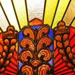Stained glass decoration seen above one of the entrances to the Exchange Building in Seattle. Photo by Ray Tsang.