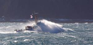 The 110-foot United States Coast Guard Cutter Liberty cuts through rough water off South Shelter.(Photo by Jay Beedle)