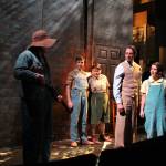 Scout (Seth Coppens) talks down the mob at the jailhouse. Photo by Julie Coppens.