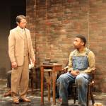 Atticus puts Tom Robinson on the witness stand. Left is Enrique Bravo (Atticus Finch). Right is Keith McCoy (Tom Robinson). Photo by Julie Coppens.